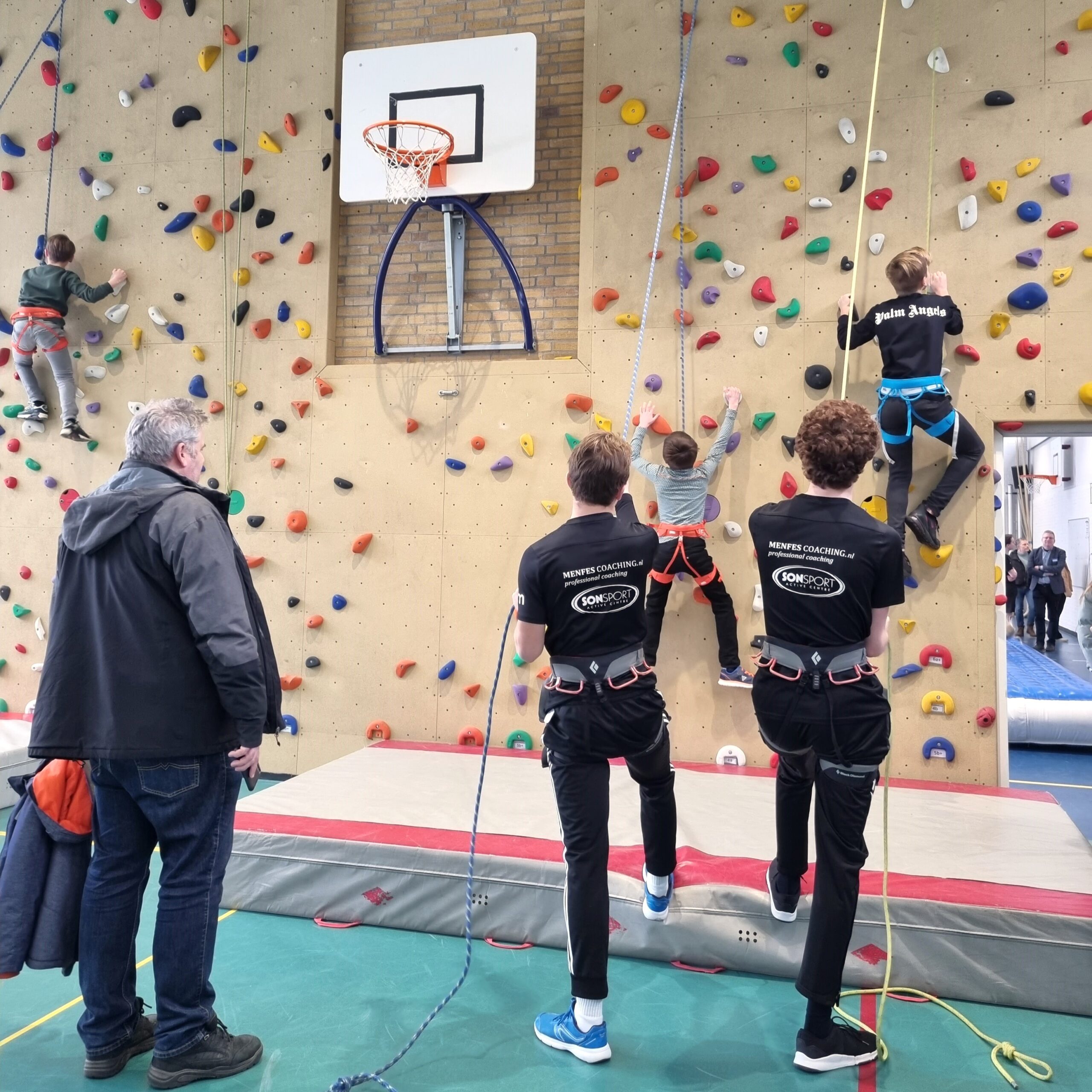 try out climbing wall during open day